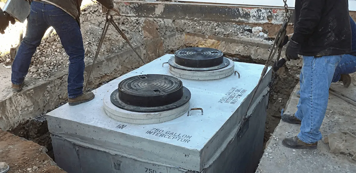 Grease trap installation for a commercial property drainage system in Albuquerque, NM