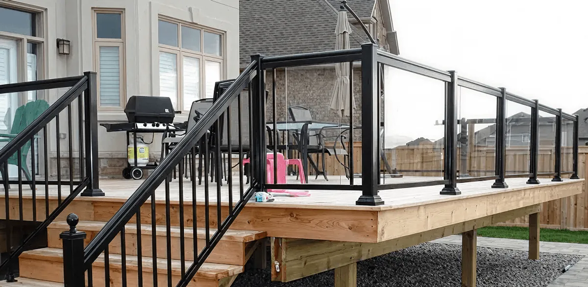 Handrail installation on a deck staircase for safety and code compliance in Albuquerque, NM